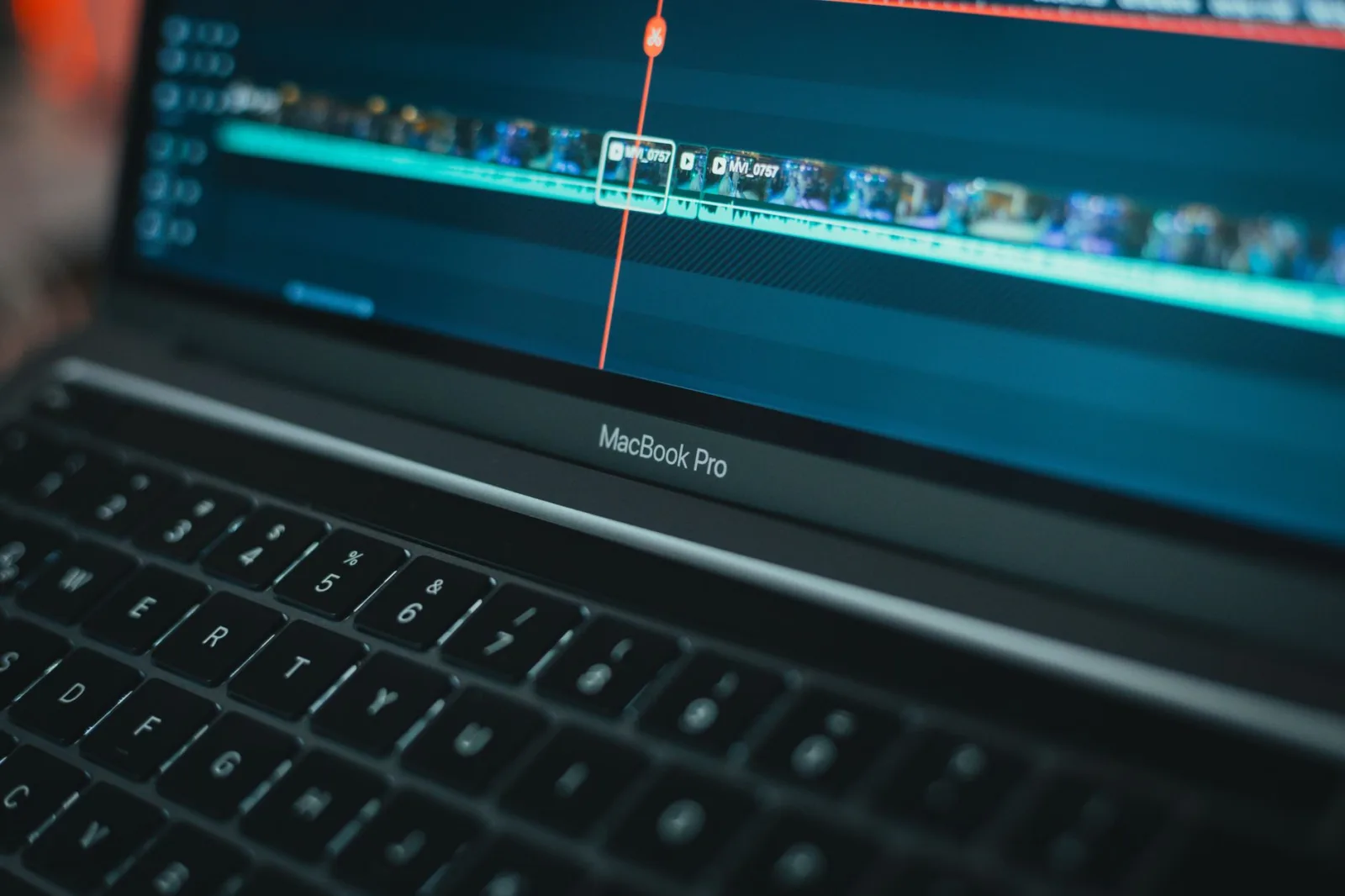 A laptop screen showing the timeline inside video editing software
